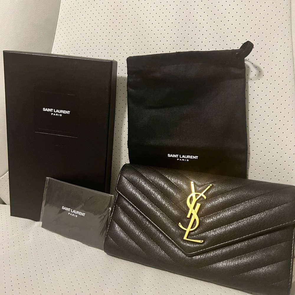 Saint Laurent Black Quilted Bag/Wallet with Gold Emblem